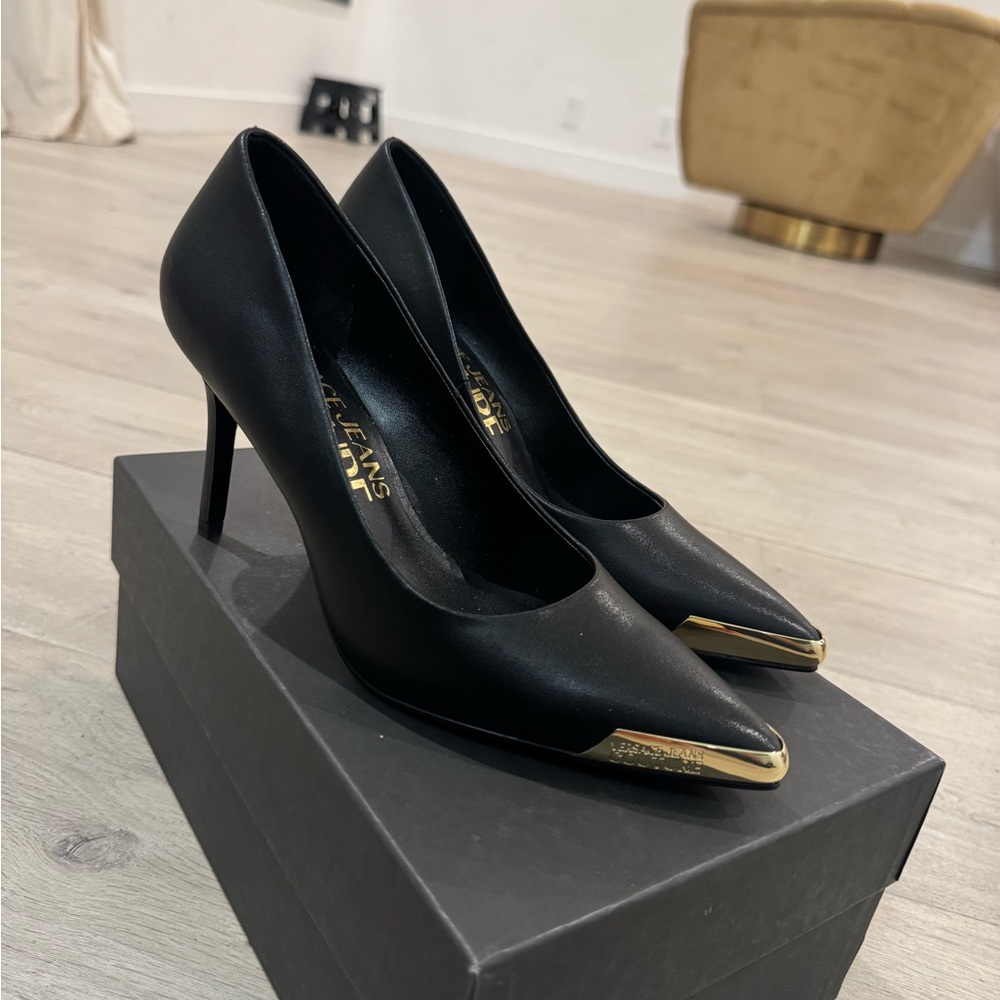 Elegant Black Heels with Gold Accents
